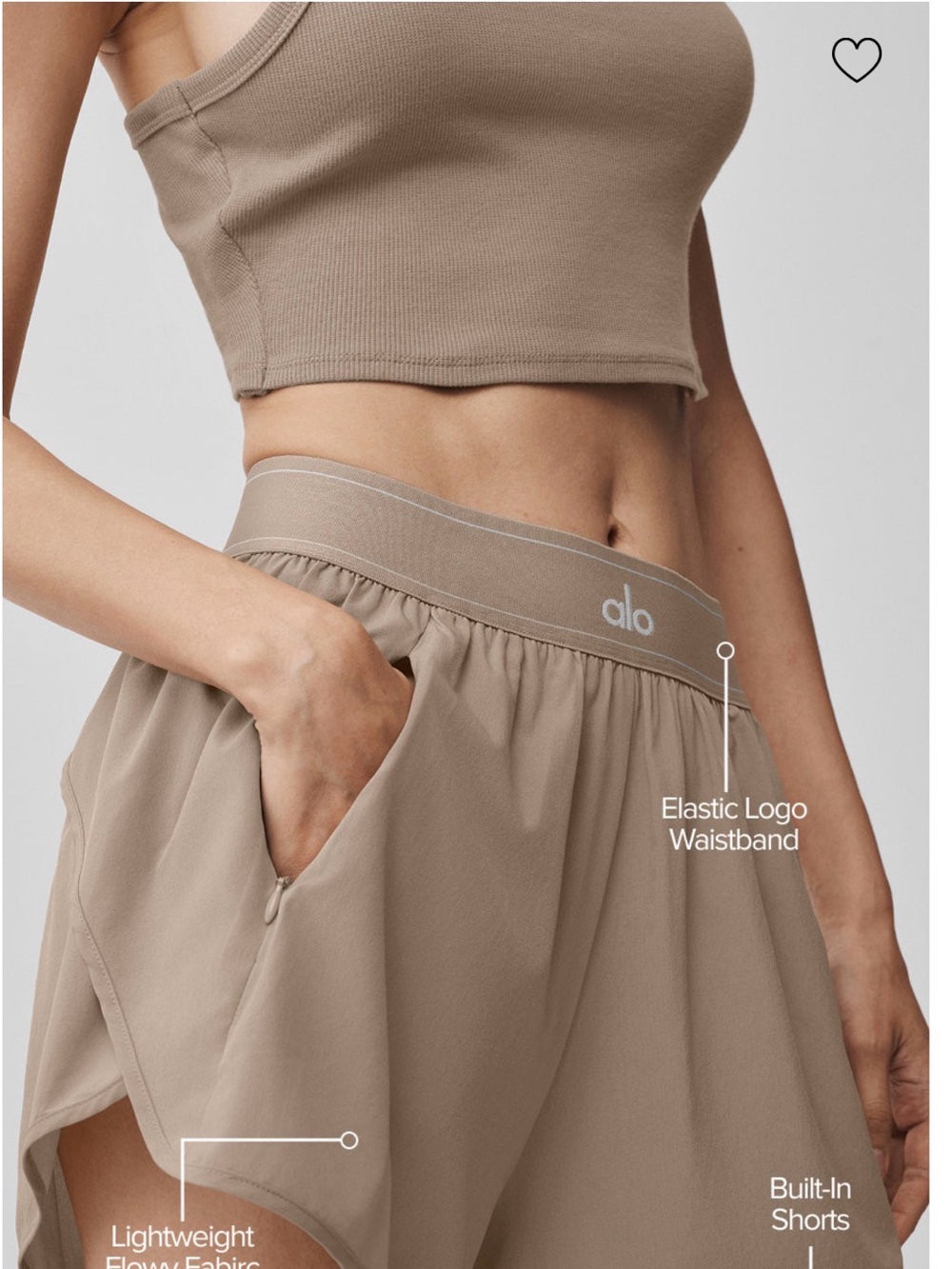 ALO Yoga match point shorts in the color gravel size large